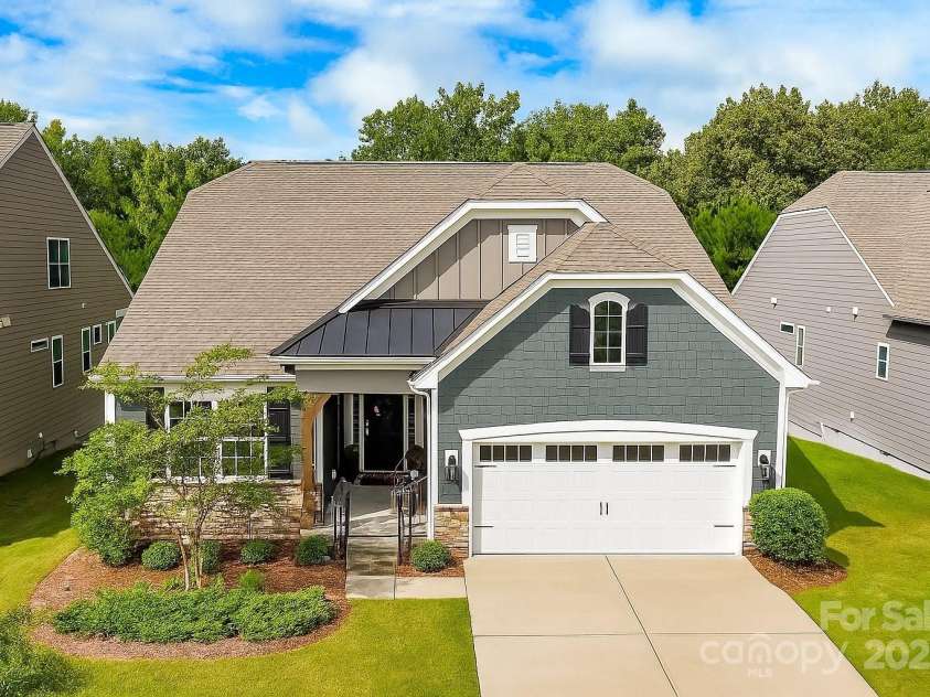 1733 Tranquility Boulevard, Lancaster, SC 29720.  MLS# CAR4275951, YatesRealty ID 32620. Drone View of Home Exterior and Private Lot that Views Mature Trees