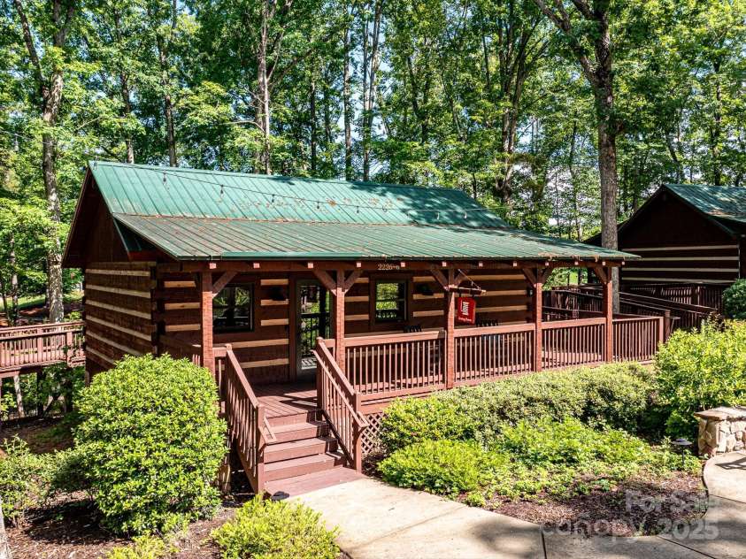 1733 Tranquility Boulevard, Lancaster, SC 29720.  MLS# CAR4275951, YatesRealty ID 32620. Village Cabins host smaller Venues such as Billiards, Cards, Crafts, Yoga, Sewing and More!