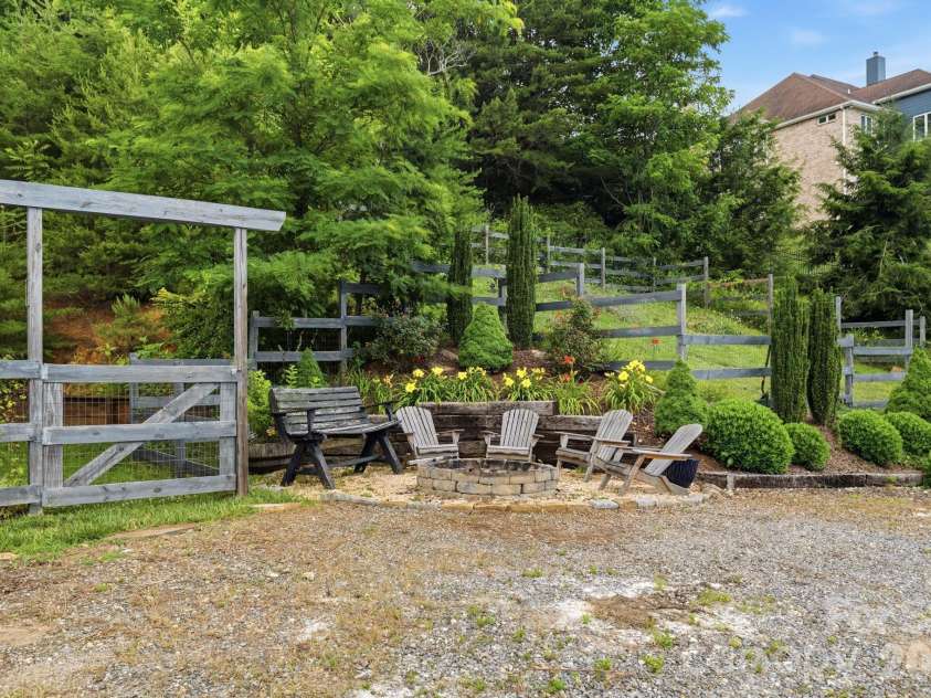 45 Barebridge Hills Drive, Asheville, NC 28804.  MLS# CAR4393566, YatesRealty ID 32625. Fire Pit and Sitting Area