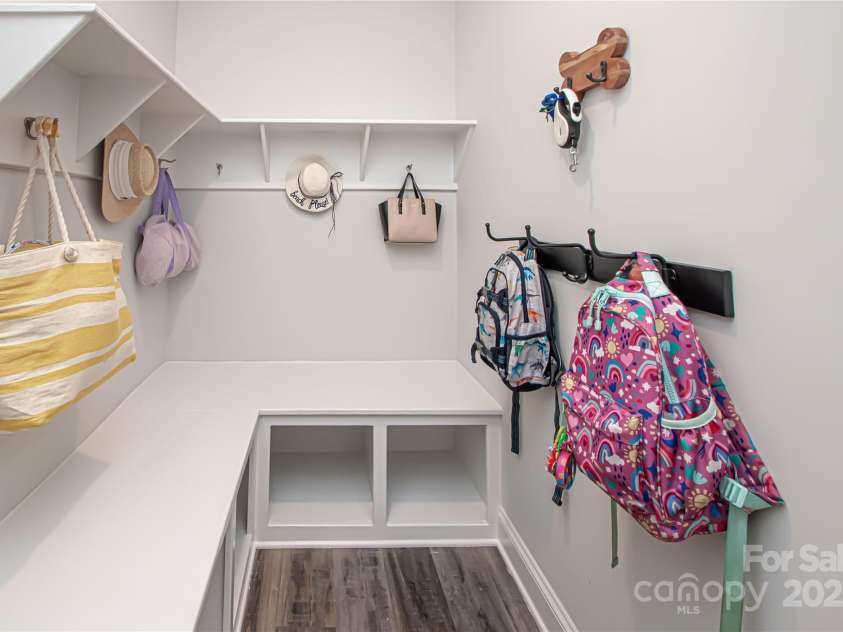 1061 Ansley Park Drive, Fort Mill, SC 29707.  MLS# CAR4281028, YatesRealty ID 32626. The drop zone, conveniently located next to the garage, is perfect for organizing backpacks, shoes, and everyday essentials.