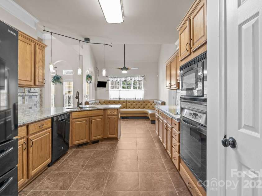 10179 Claybrooke Drive, Charlotte, NC 28262.  MLS# CAR4281474, YatesRealty ID 32627. Another view of the kitchen