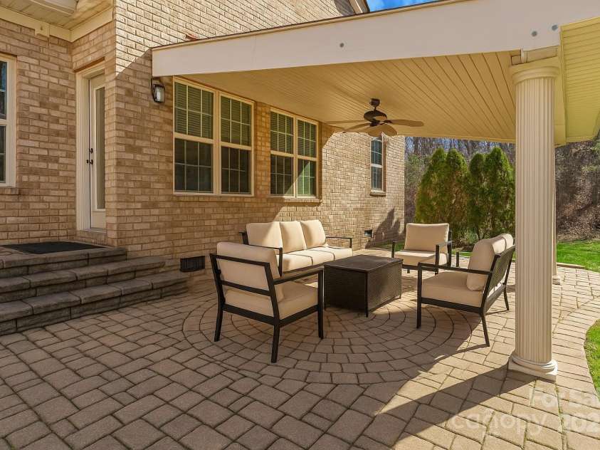 10179 Claybrooke Drive, Charlotte, NC 28262.  MLS# CAR4281474, YatesRealty ID 32627. Cover Patio (viturally enhanced)