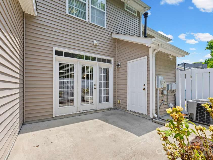 8244 Carob Tree Lane, Charlotte, NC 28215.  MLS# CAR4390168, YatesRealty ID 32627. Additional storage in the utility room