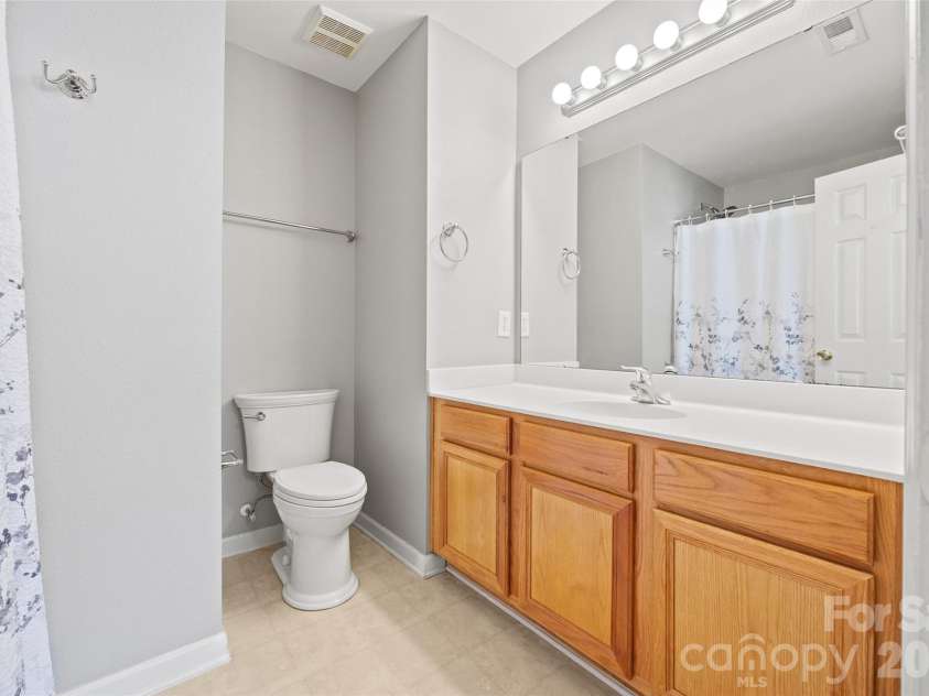 8244 Carob Tree Lane, Charlotte, NC 28215.  MLS# CAR4390168, YatesRealty ID 32627. Both with attached full bathrooms