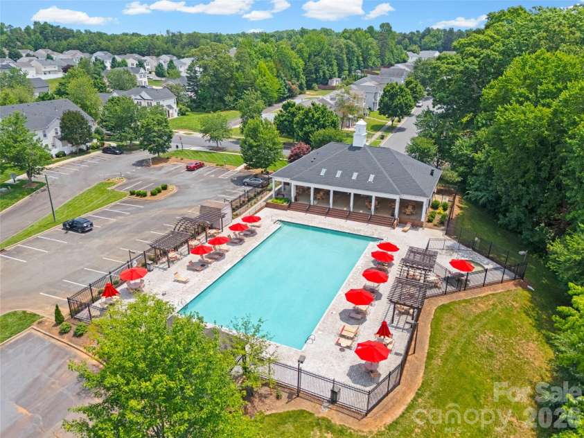 8244 Carob Tree Lane, Charlotte, NC 28215.  MLS# CAR4390168, YatesRealty ID 32627. Relax by the pool