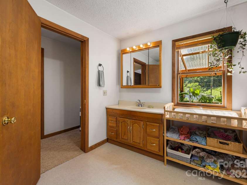 799 Fire Scald Road, Green Mountain, NC 28740.  MLS# CAR4226688, YatesRealty ID 32632. 