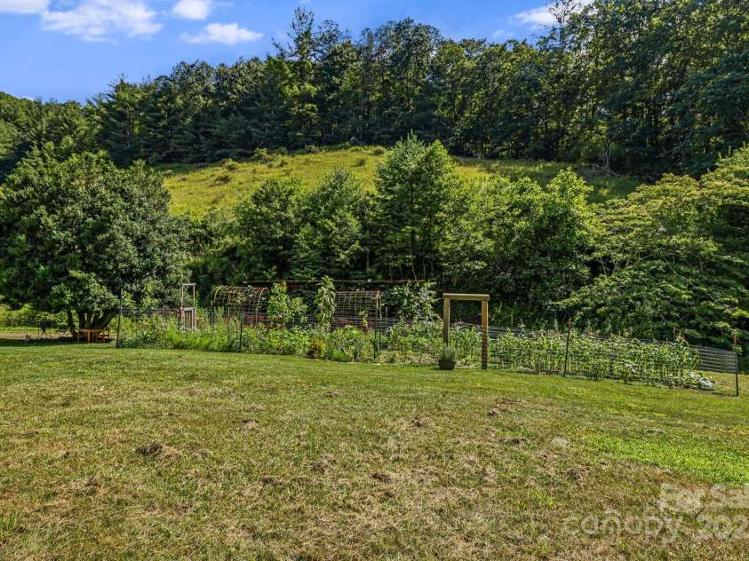 799 Fire Scald Road, Green Mountain, NC 28740.  MLS# CAR4226688, YatesRealty ID 32632. Garden