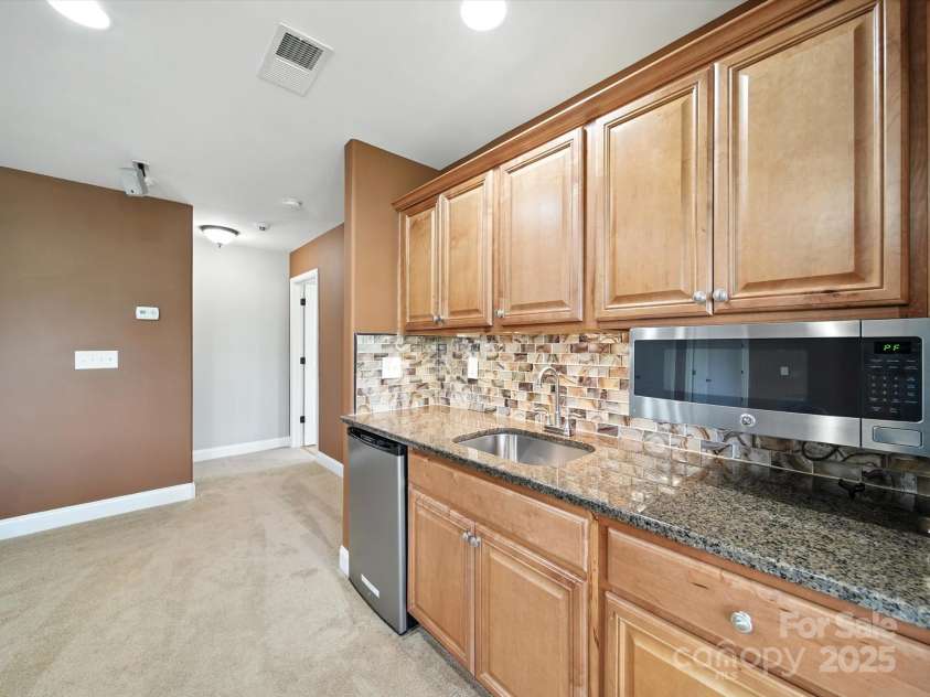 1402 Wynhurst Drive, Waxhaw, NC 28173.  MLS# CAR4290603, YatesRealty ID 32635. 3rd level mini-kitchen.