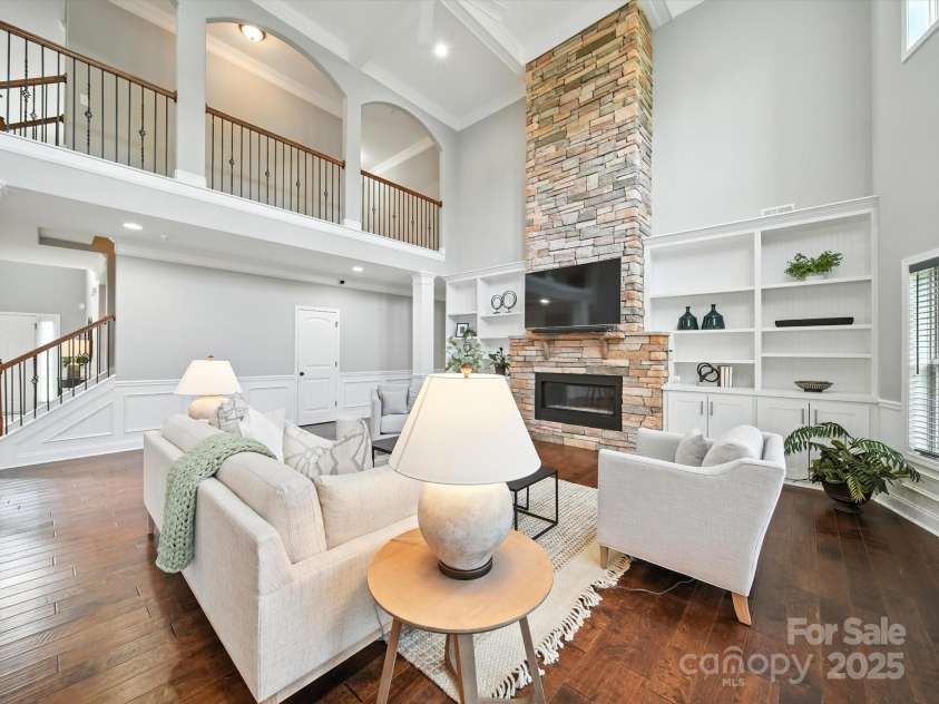 1402 Wynhurst Drive, Waxhaw, NC 28173.  MLS# CAR4290603, YatesRealty ID 32635. Family room with a view of the catwalk.
