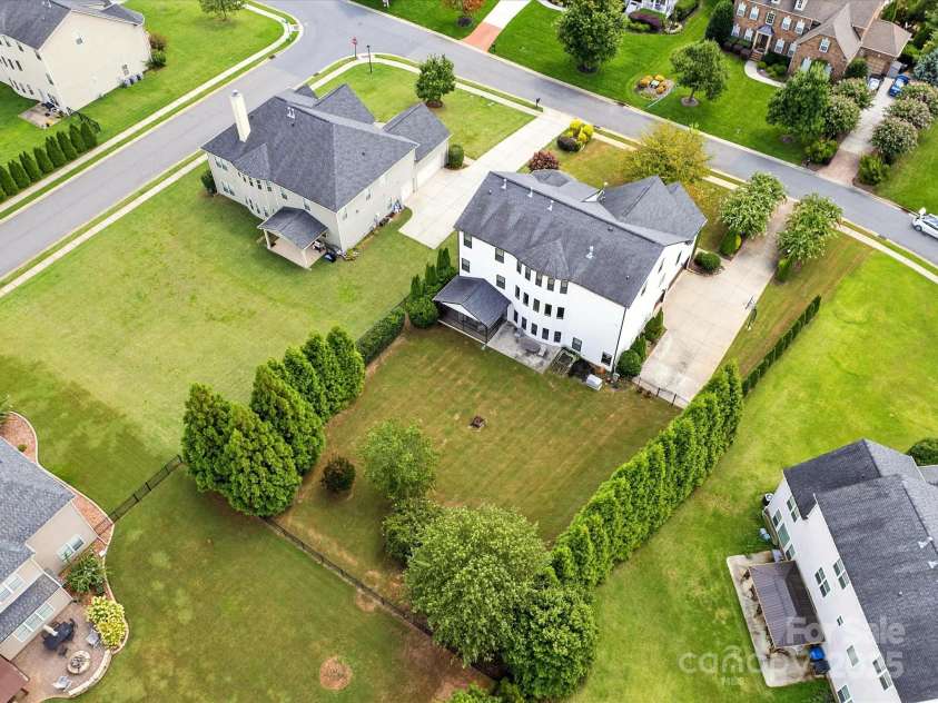 1402 Wynhurst Drive, Waxhaw, NC 28173.  MLS# CAR4290603, YatesRealty ID 32635. Flat backyard landscaped for privacy!