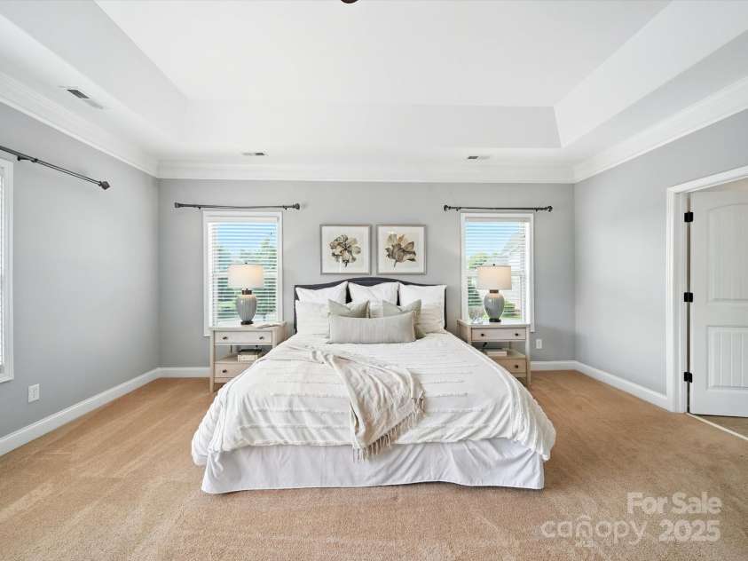 1402 Wynhurst Drive, Waxhaw, NC 28173.  MLS# CAR4290603, YatesRealty ID 32635. Lots of natural light in the primary bedroom.