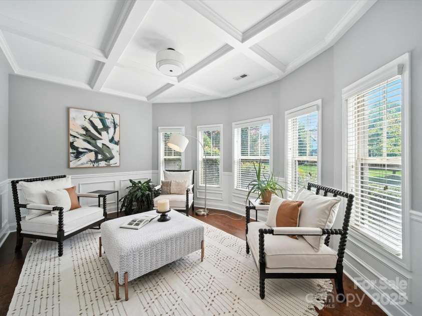 1402 Wynhurst Drive, Waxhaw, NC 28173.  MLS# CAR4290603, YatesRealty ID 32635. Stunning living room with coffered ceiling.