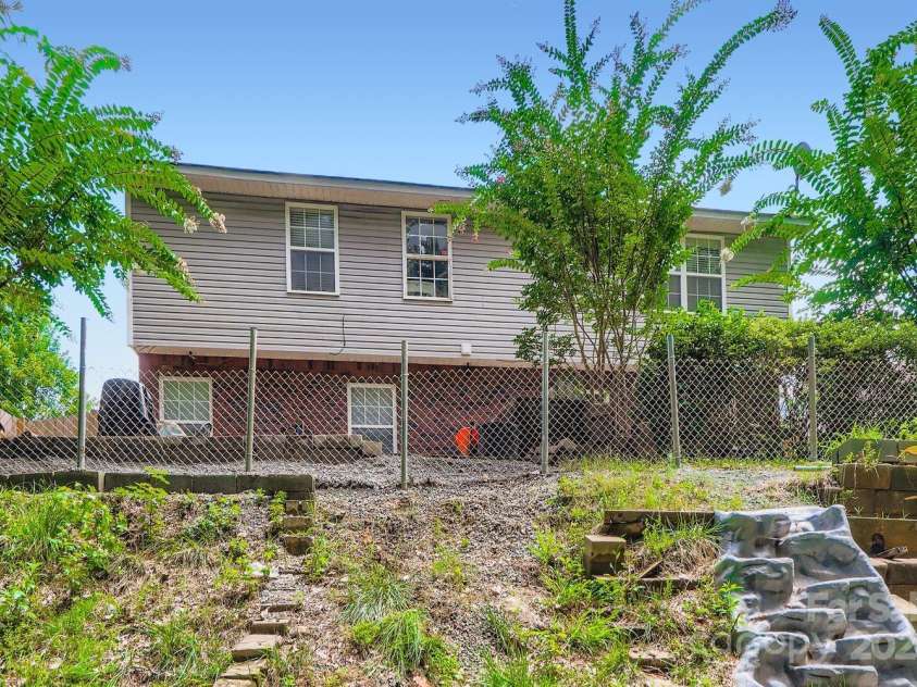 10605 Turkey Point Drive, Charlotte, NC 28214.  MLS# CAR4291887, YatesRealty ID 32642. Back View