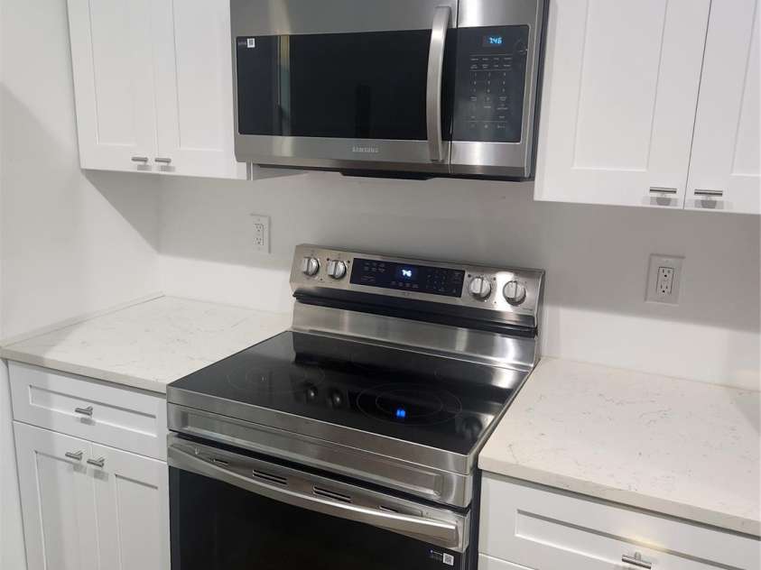 704 Harding Avenue, Kannapolis, NC 28083.  MLS# CAR4275588, YatesRealty ID 32647. Kitchen Appliances Stove and Built in Microwave