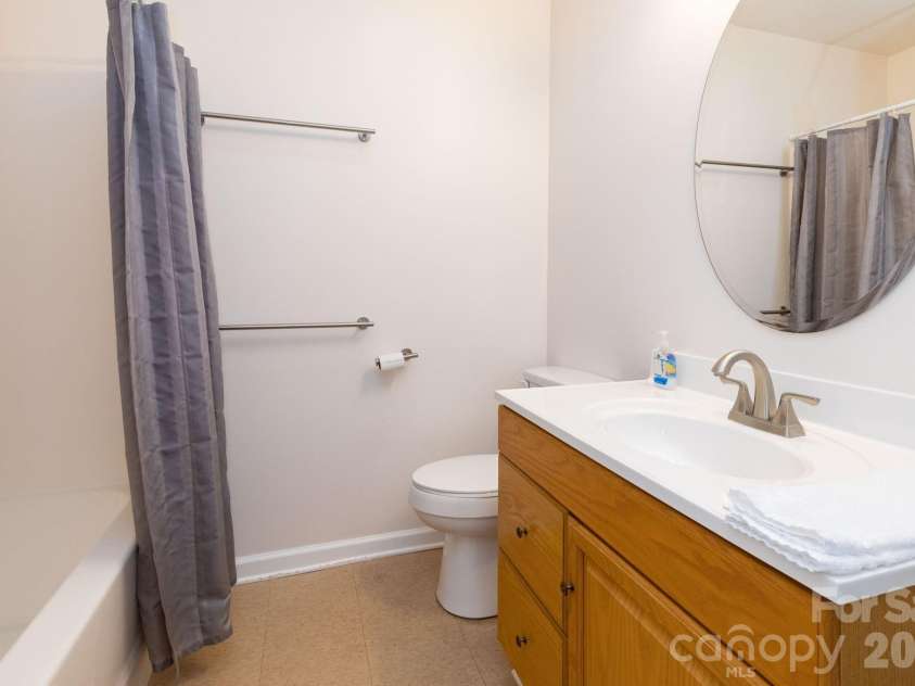 12 Lila Lane, Clyde, NC 28721.  MLS# CAR4377742, YatesRealty ID 32653. Bottom Level Bathroom