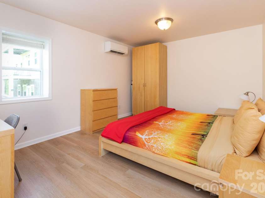 12 Lila Lane, Clyde, NC 28721.  MLS# CAR4377742, YatesRealty ID 32653. Bottom Level Sleeping Room