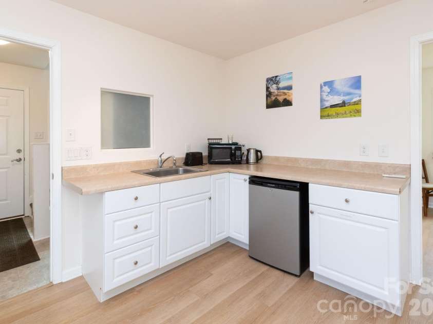 12 Lila Lane, Clyde, NC 28721.  MLS# CAR4377742, YatesRealty ID 32653. Main Level Kitchenette
