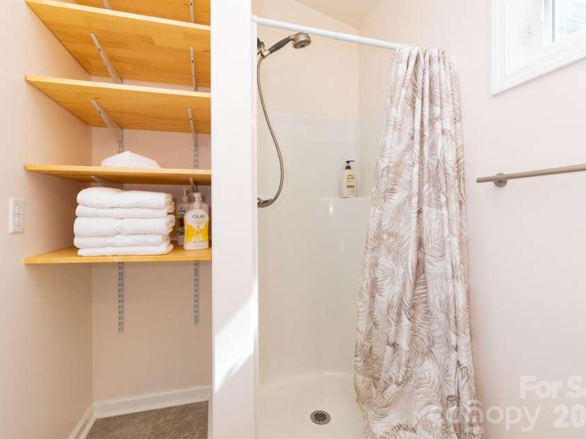 12 Lila Lane, Clyde, NC 28721.  MLS# CAR4377742, YatesRealty ID 32653. Upper Level Bathroom