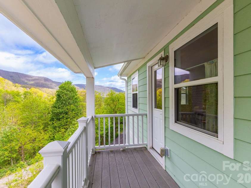 12 Lila Lane, Clyde, NC 28721.  MLS# CAR4377742, YatesRealty ID 32653. Upper Level Covered Deck