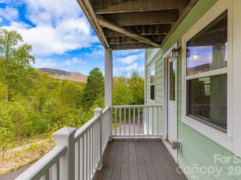 12 Lila Lane, Clyde, NC 28721.  MLS# CAR4377742, YatesRealty ID 32653. Upper Level Covered Deck