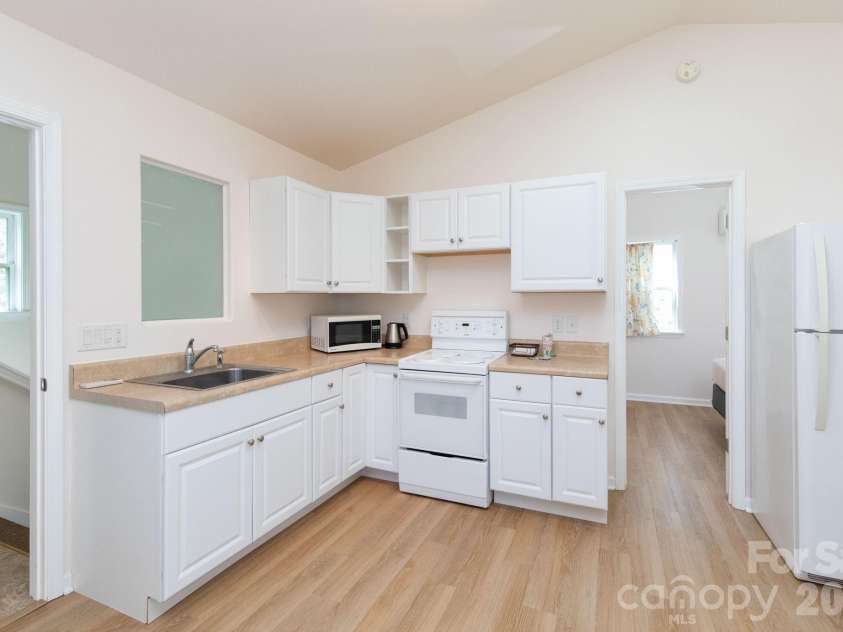 12 Lila Lane, Clyde, NC 28721.  MLS# CAR4377742, YatesRealty ID 32653. Upper Level Kitchen
