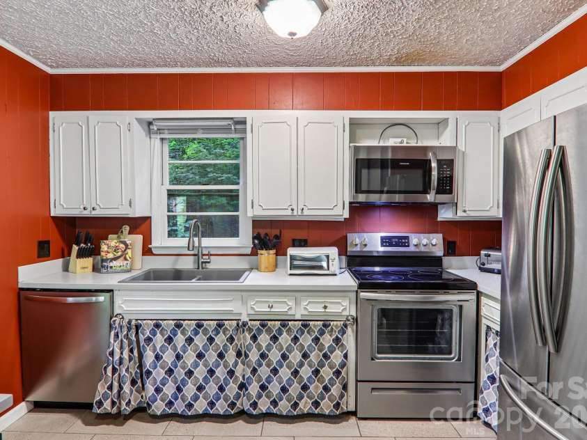 330 Riddle Cove Road, Maggie Valley, NC 28751.  MLS# CAR4395479, YatesRealty ID 32657. 