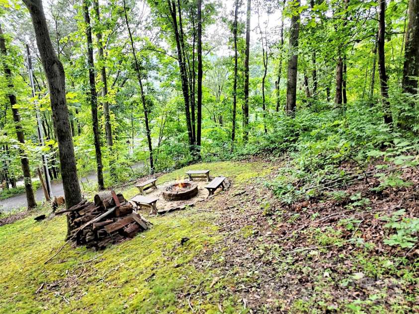 346 Wendy Way, Clyde, NC 28721.  MLS# CAR4289495, YatesRealty ID 32667. Firepit