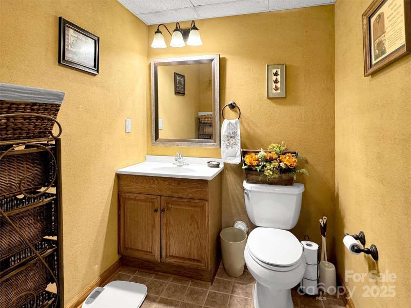 346 Wendy Way, Clyde, NC 28721.  MLS# CAR4289495, YatesRealty ID 32667. Lower Level Half Bath