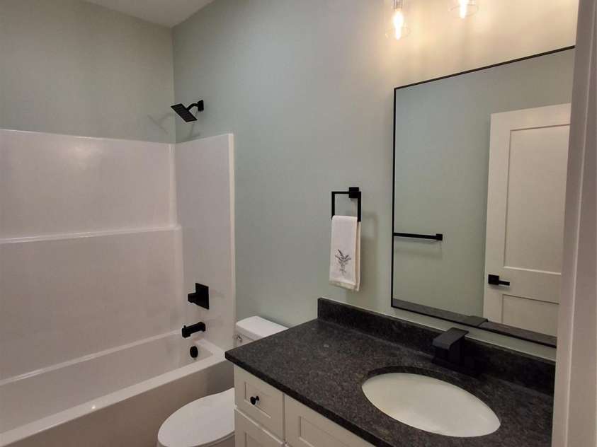 128 Hedgeline Drive, Troy, NC 27371.  MLS# CAR4338072, YatesRealty ID 3267. Hall Bath