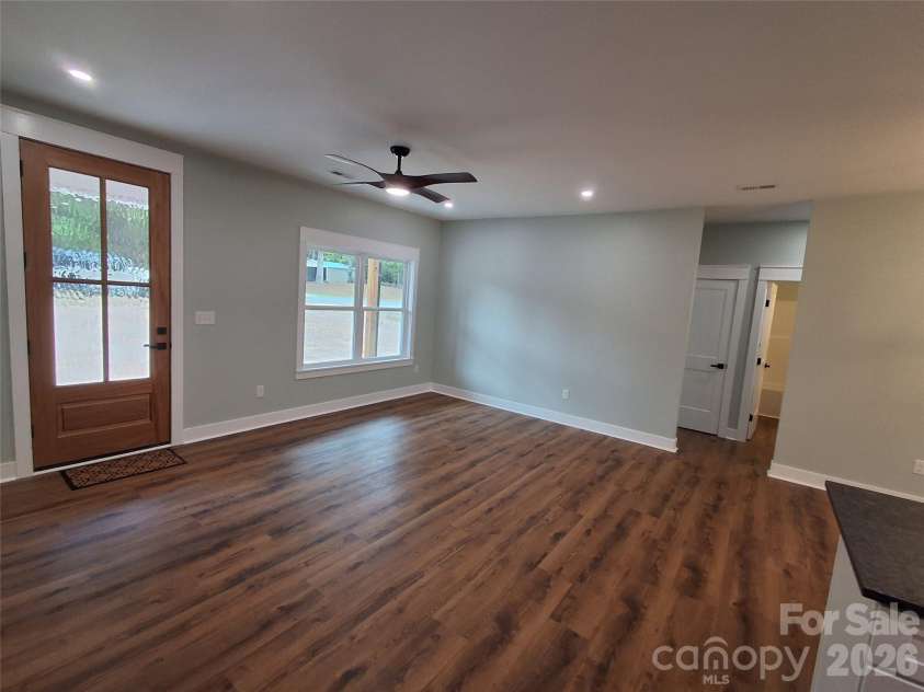 128 Hedgeline Drive, Troy, NC 27371.  MLS# CAR4338072, YatesRealty ID 3267. Living Room