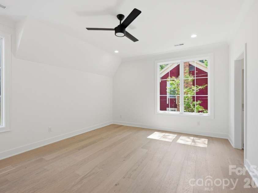235 Jetton Street, Davidson, NC 28036.  MLS# CAR4391336, YatesRealty ID 32675. Bed / bonus on second level with wet bar