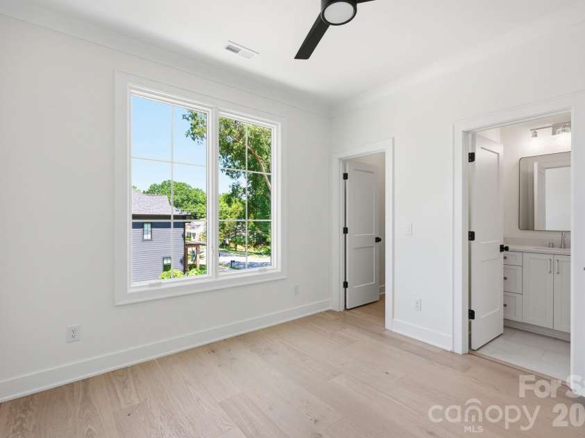 235 Jetton Street, Davidson, NC 28036.  MLS# CAR4391336, YatesRealty ID 32675. Bedroom with attached bath