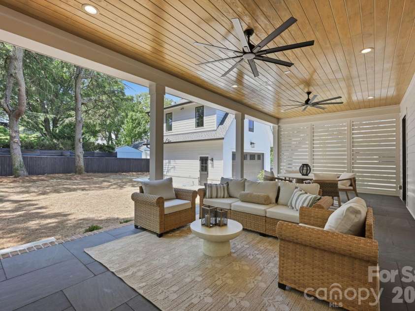 235 Jetton Street, Davidson, NC 28036.  MLS# CAR4391336, YatesRealty ID 32675. Covered rear porch