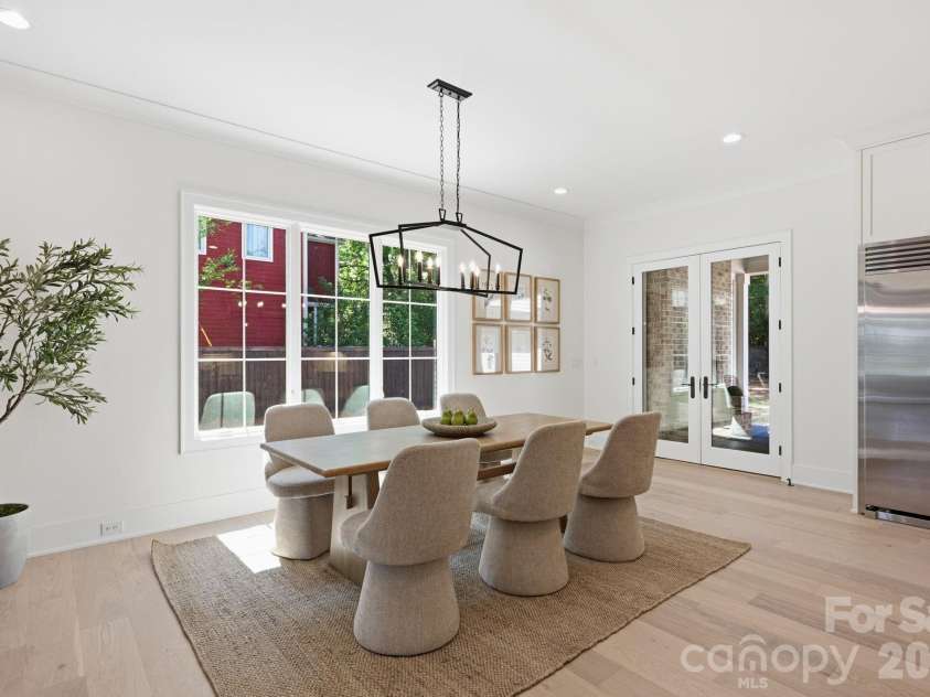 235 Jetton Street, Davidson, NC 28036.  MLS# CAR4391336, YatesRealty ID 32675. Dining area with access to rear porch