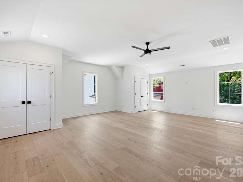 235 Jetton Street, Davidson, NC 28036.  MLS# CAR4391336, YatesRealty ID 32675. Finished studio space above detached garage