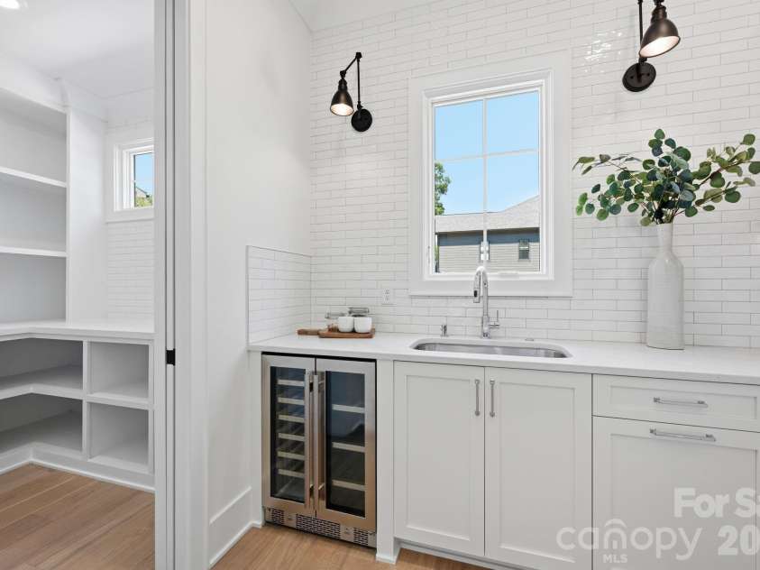 235 Jetton Street, Davidson, NC 28036.  MLS# CAR4391336, YatesRealty ID 32675. Scullery and pantry