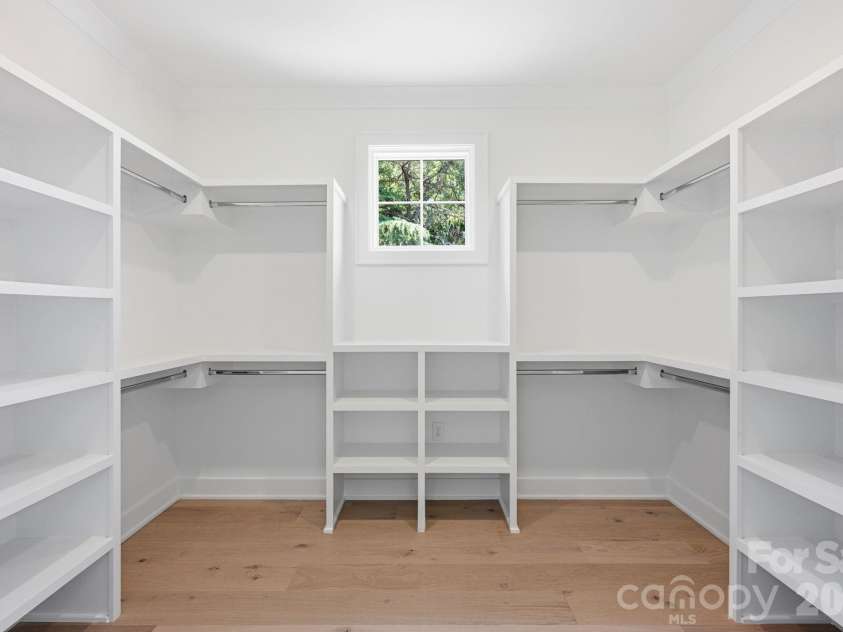 235 Jetton Street, Davidson, NC 28036.  MLS# CAR4391336, YatesRealty ID 32675. Walk in primary closet