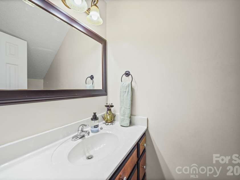 1160 Crestmont Drive, Concord, NC 28025.  MLS# CAR4357365, YatesRealty ID 32681. Half bath