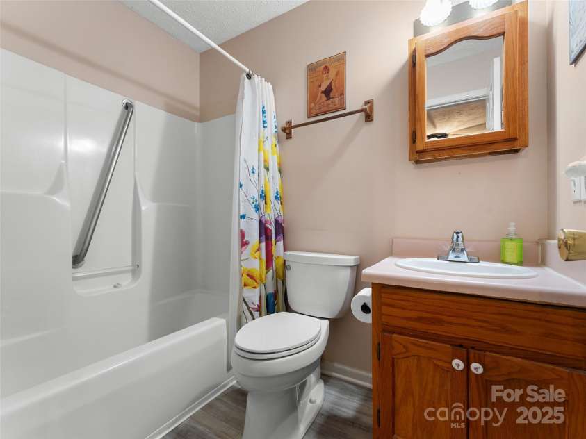 437 Rutledge Drive, Hendersonville, NC 28739.  MLS# CAR4286995, YatesRealty ID 32686. Cottage bathroom.