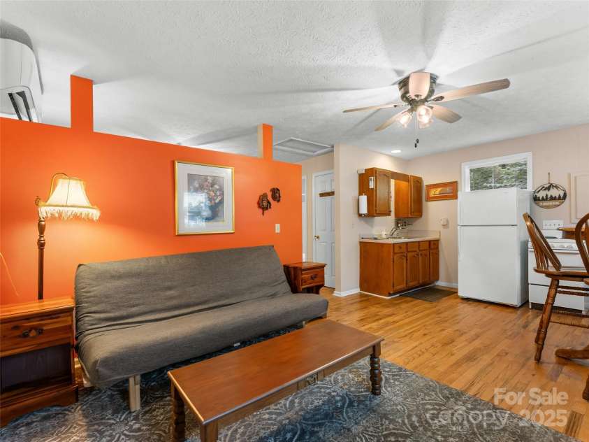 437 Rutledge Drive, Hendersonville, NC 28739.  MLS# CAR4286995, YatesRealty ID 32686. Cottage living room.