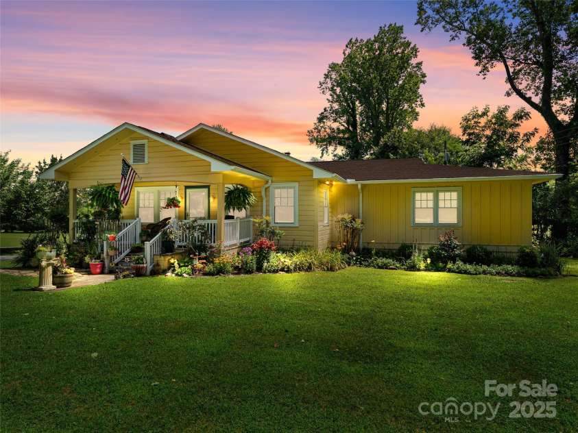 437 Rutledge Drive, Hendersonville, NC 28739.  MLS# CAR4286995, YatesRealty ID 32686. Virtual twilight view.