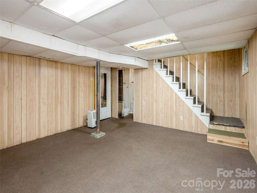 79 Edgewood Drive, Arden, NC 28704.  MLS# CAR4397224, YatesRealty ID 32695. Basement Flex Room