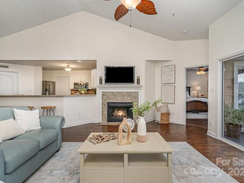 18643 Harborside Drive, Cornelius, NC 28031.  MLS# CAR4243149, YatesRealty ID 32699. Living Room with Gas Fireplace