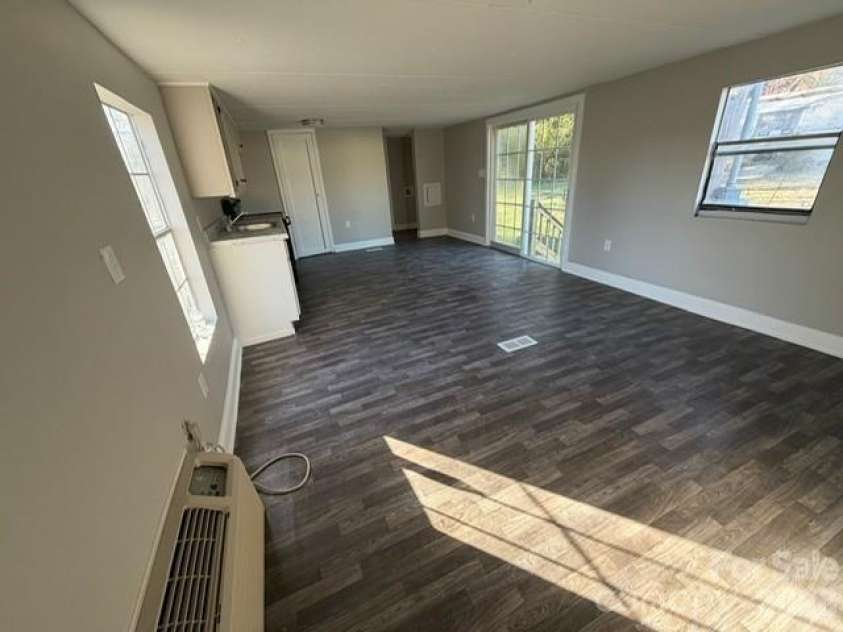 4417 Grier Street, Gastonia, NC 28056.  MLS# CAR4353987, YatesRealty ID 3270. Living and kitchen combined