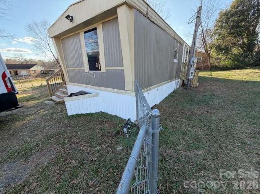 4417 Grier Street, Gastonia, NC 28056.  MLS# CAR4353987, YatesRealty ID 3270. Side and back 
