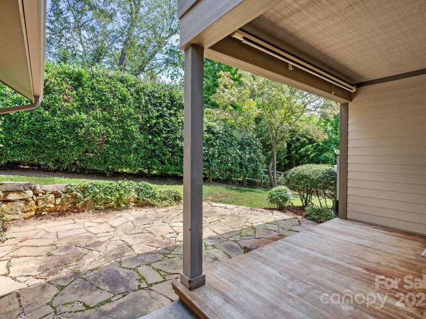 109 Zander Way, Asheville, NC 28805.  MLS# CAR4292315, YatesRealty ID 32706. Covered back porch with an area for a hot tub? grill?