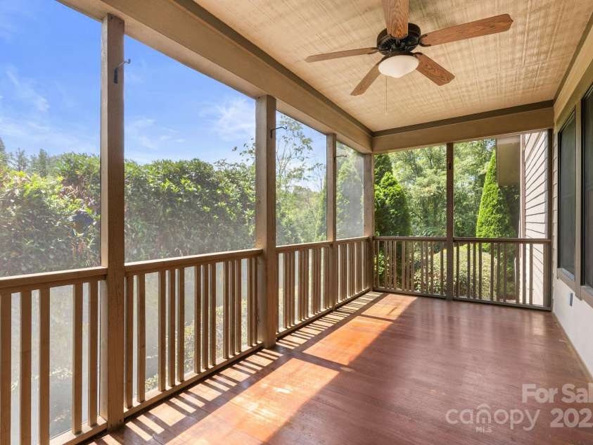 109 Zander Way, Asheville, NC 28805.  MLS# CAR4292315, YatesRealty ID 32706. Screen porch off of the dining area