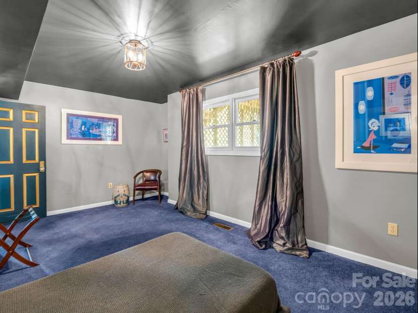 8 Sunny Ridge Drive, Asheville, NC 28804.  MLS# CAR4389104, YatesRealty ID 32706. Lower level bed room