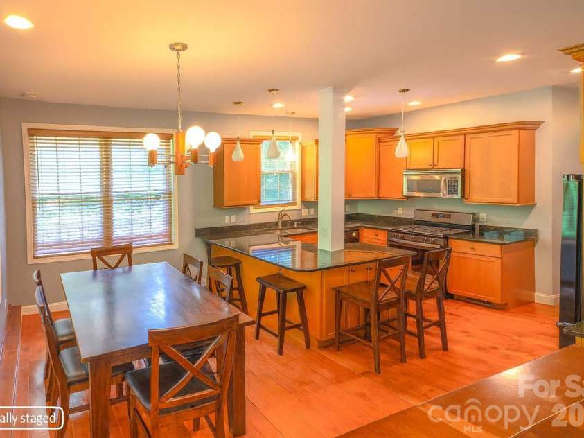 340 Old Haw Creek Road, Asheville, NC 28805.  MLS# CAR4394261, YatesRealty ID 32709. Virtually Staged Breakfast nook and kitchen
