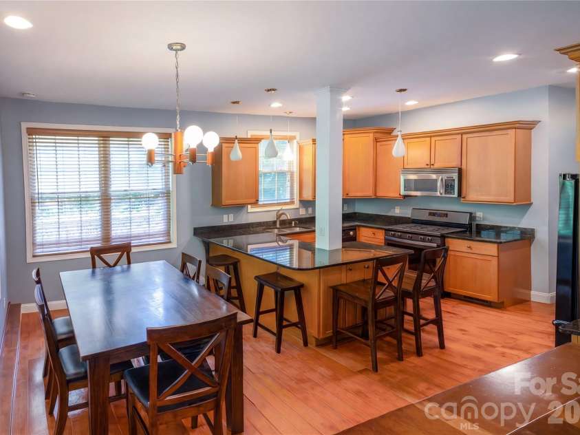 340 Old Haw Creek Road, Asheville, NC 28805.  MLS# CAR4394261, YatesRealty ID 32709. Virtually Staged Breakfast nook and kitchen